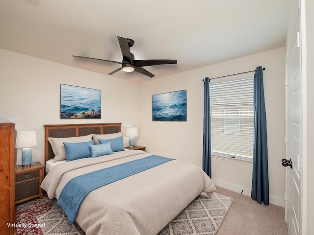 bedroom with carpet floors, baseboards, and a ceiling fan