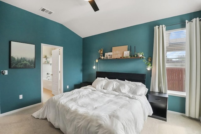 bedroom featuring carpet, visible vents, vaulted ceiling, and baseboards