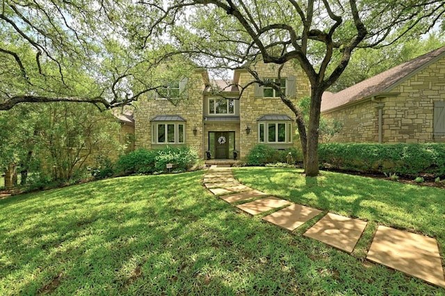 2405 Westlake Pass, Austin, TX 78746 - english style home featuring stone siding and a front lawn