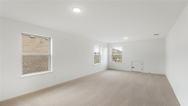 112 Amber Oak Ln, Georgetown, TX 78628 - unfurnished room with light colored carpet, recessed lighting, and baseboards