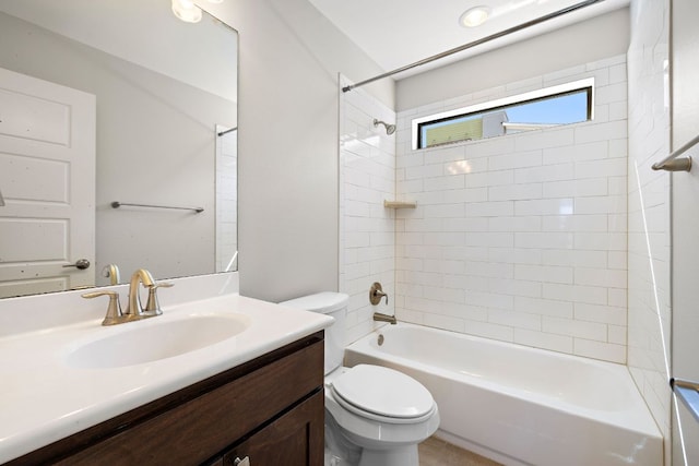 full bathroom featuring shower / washtub combination, vanity, and toilet