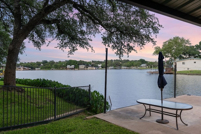 water view featuring fence