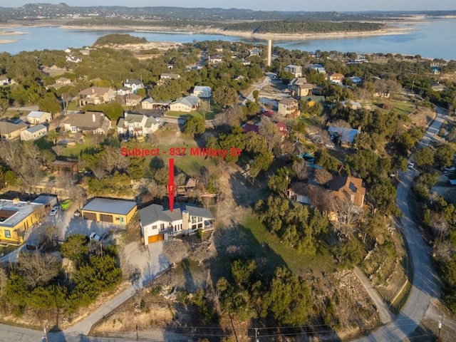 aerial view featuring a water view and a residential view