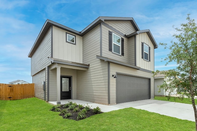 view of front of property with a garage, concrete driveway, fence, board and batten siding, and a front yard