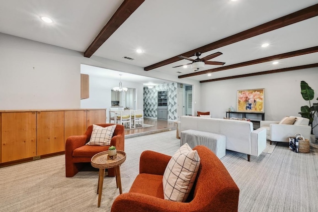 living room featuring recessed lighting, beam ceiling, and visible vents