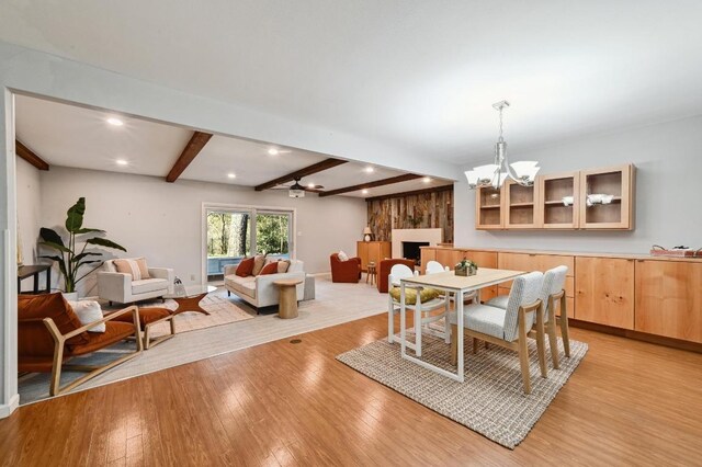2403 Remuda Trl, Austin, TX 78745 - dining space with recessed lighting, beamed ceiling, light wood finished floors, a chandelier, and baseboards