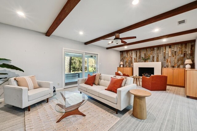 2403 Remuda Trl, Austin, TX 78745 - living area with recessed lighting, beam ceiling, a ceiling fan, baseboards, and light carpet