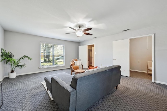 2403 Remuda Trl, Austin, TX 78745 - carpeted living area with a ceiling fan and baseboards