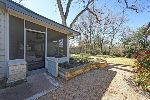 2403 Remuda Trl, Austin, TX 78745 - view of yard with a sunroom