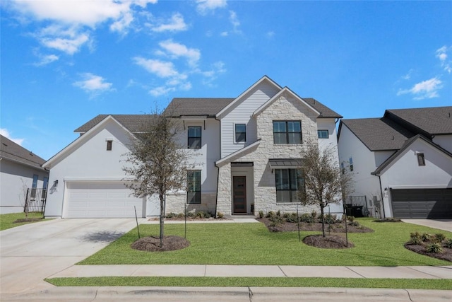 view of front of house featuring driveway, stone siding, a garage, and a front lawn