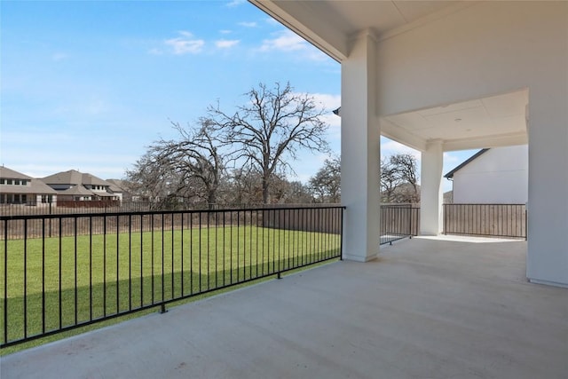 view of patio featuring fence