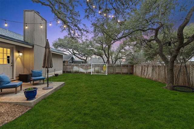 view of yard featuring a fenced backyard and a patio