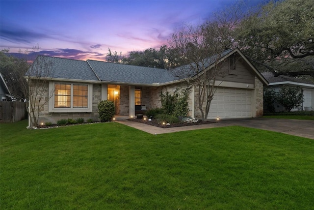 ranch-style house with an attached garage, a shingled roof, fence, driveway, and a front lawn