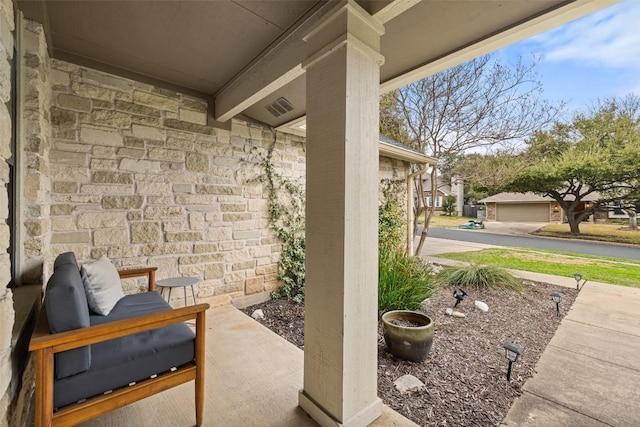 view of patio with visible vents