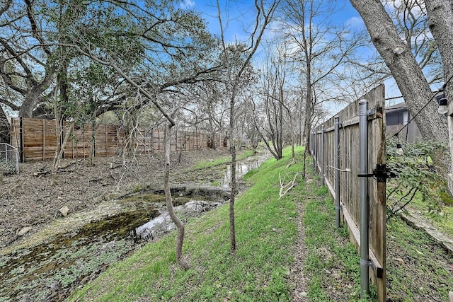 view of yard with fence