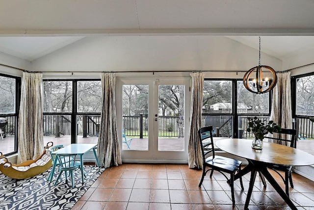 sunroom / solarium with lofted ceiling and plenty of natural light