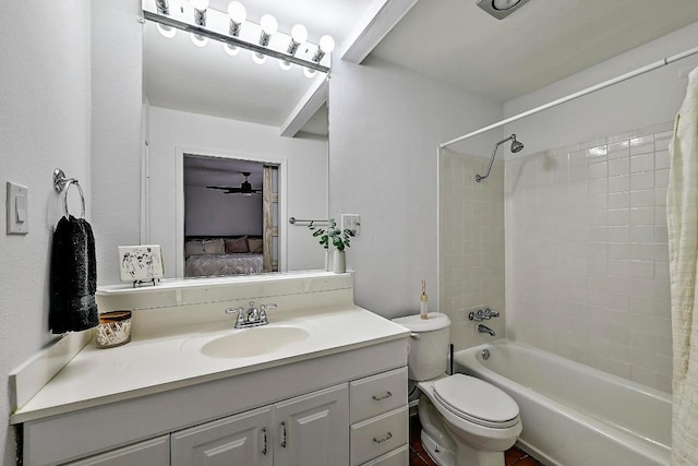 full bathroom featuring shower / bath combination with curtain, toilet, vanity, and ensuite bath