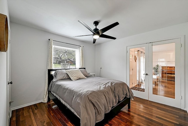 bedroom featuring french doors, wood finished floors, a ceiling fan, and baseboards