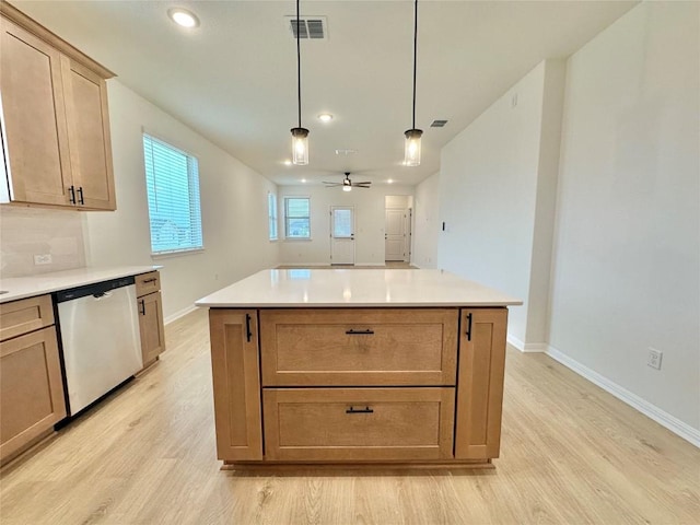 255 Glocken Ln, Kyle, TX 78640 - kitchen with stainless steel dishwasher, light wood finished floors, baseboards, ceiling fan, and recessed lighting