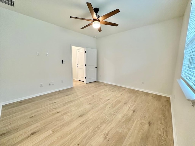 255 Glocken Ln, Kyle, TX 78640 - empty room featuring ceiling fan, light wood-type flooring, and baseboards