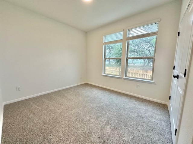 255 Glocken Ln, Kyle, TX 78640 - spare room featuring carpet floors and baseboards