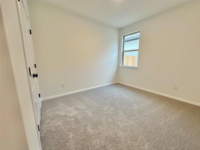 255 Glocken Ln, Kyle, TX 78640 - empty room featuring carpet and baseboards