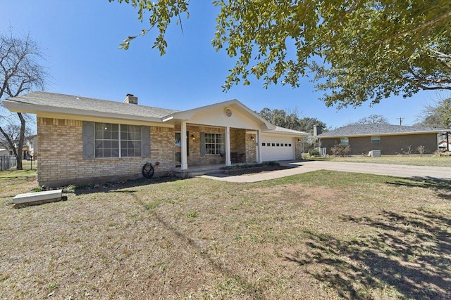 ranch-style house with brick siding, a chimney, a front yard, a garage, and driveway