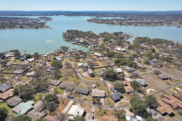 bird's eye view with a water view and a residential view