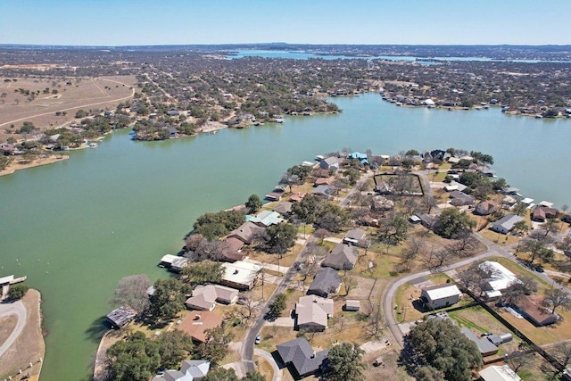 bird's eye view with a water view and a residential view