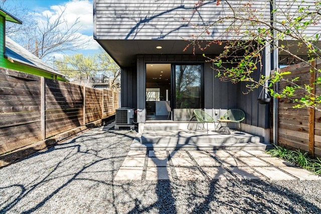 view of patio featuring a fenced backyard and cooling unit