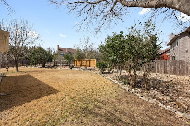 view of yard featuring a fenced backyard