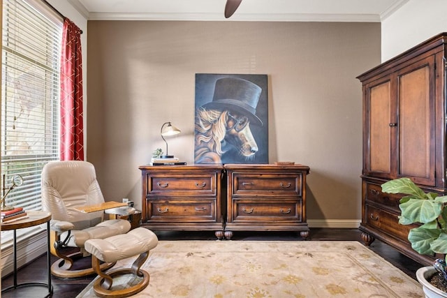 1428 Rowan Dr, Georgetown, TX 78628 - sitting room with ornamental molding, baseboards, ceiling fan, and wood finished floors