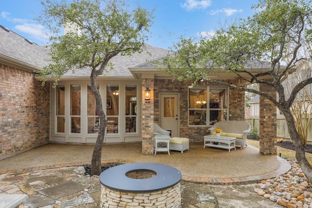 view of patio with an outdoor fire pit