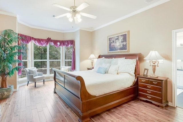 bedroom featuring ornamental molding, a ceiling fan, connected bathroom, and wood finished floors