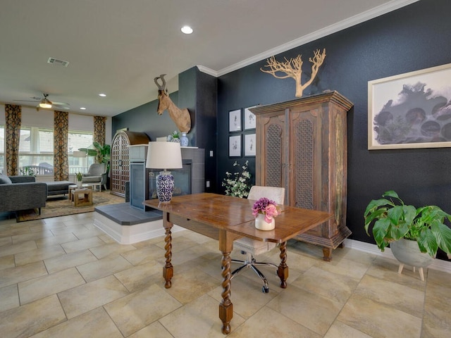 dining area featuring baseboards, visible vents, a tile fireplace, crown molding, and recessed lighting