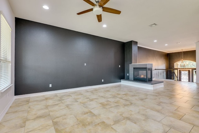 804 San Remo Blvd Unit 26B, Lakeway, TX 78734 - unfurnished living room with recessed lighting, a ceiling fan, light tile patterned floors, a chandelier, and a multi sided fireplace