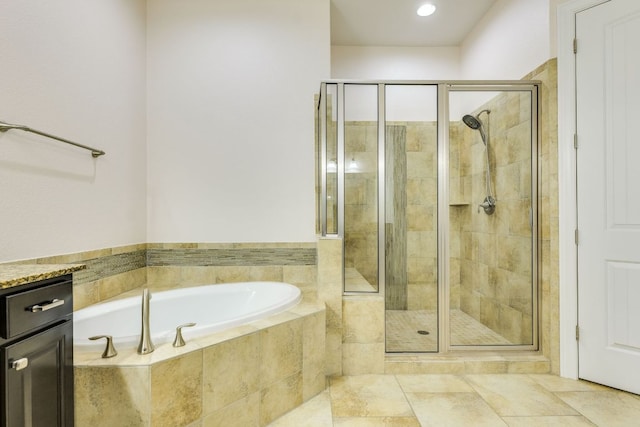 804 San Remo Blvd Unit 26B, Lakeway, TX 78734 - bathroom with a bath, tile patterned flooring, and a shower stall