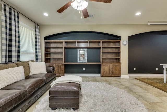 804 San Remo Blvd Unit 26B, Lakeway, TX 78734 - living room featuring ceiling fan, arched walkways, baseboards, visible vents, and recessed lighting