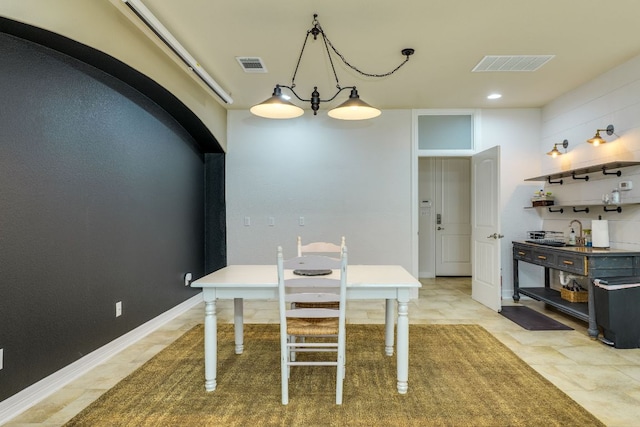 804 San Remo Blvd Unit 26B, Lakeway, TX 78734 - dining room featuring arched walkways and visible vents
