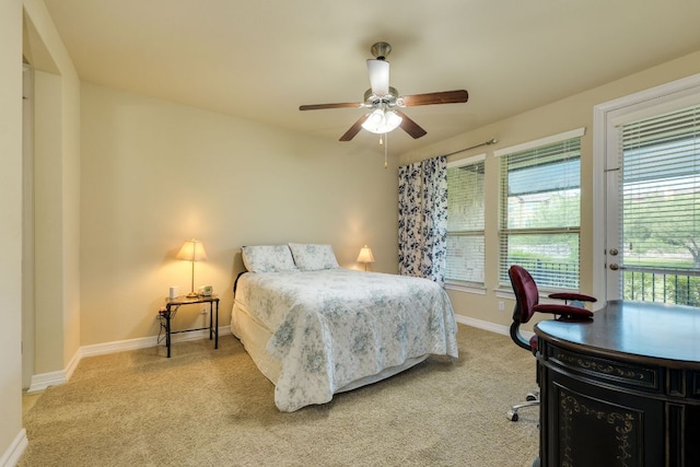 804 San Remo Blvd Unit 26B, Lakeway, TX 78734 - bedroom with baseboards, access to outside, light colored carpet, and multiple windows