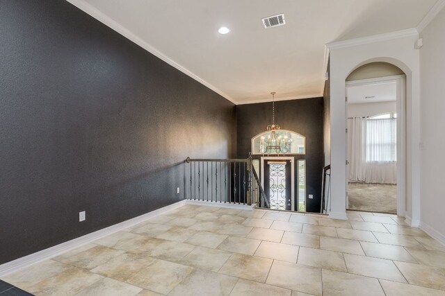804 San Remo Blvd Unit 26B, Lakeway, TX 78734 - foyer entrance with a chandelier, arched walkways, ornamental molding, and recessed lighting