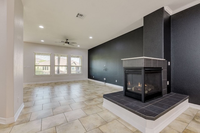 804 San Remo Blvd Unit 26B, Lakeway, TX 78734 - unfurnished living room with a ceiling fan, visible vents, recessed lighting, and a tile fireplace