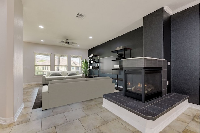 804 San Remo Blvd Unit 26B, Lakeway, TX 78734 - living room featuring recessed lighting, a tiled fireplace, visible vents, and a ceiling fan
