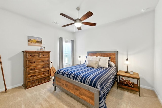 107 Trailside Ln, Bastrop, TX 78602 - carpeted bedroom with baseboards and ceiling fan