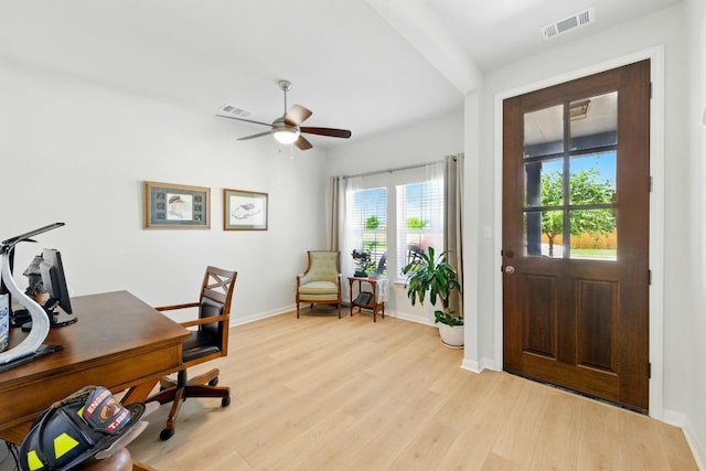 107 Trailside Ln, Bastrop, TX 78602 - office with light wood-style flooring, a ceiling fan, and baseboards