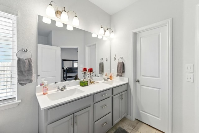 107 Trailside Ln, Bastrop, TX 78602 - full bathroom featuring double vanity and tile patterned flooring