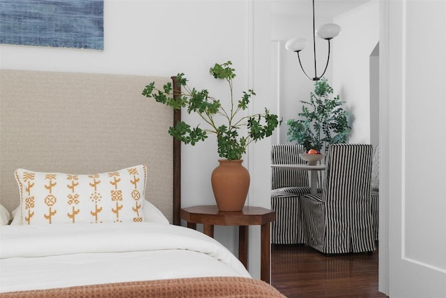 bedroom featuring wood finished floors