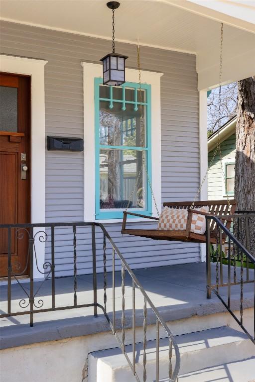 doorway to property with a porch