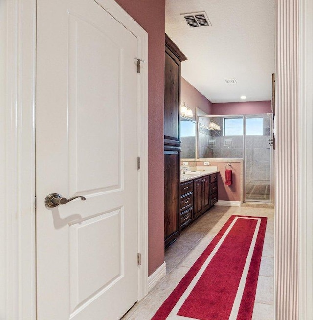 242 Saga St, Spring Branch, TX 78070 - full bathroom with vanity, a shower stall, and tile patterned flooring