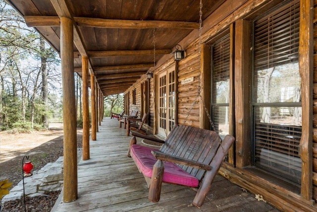 wooden deck featuring a porch